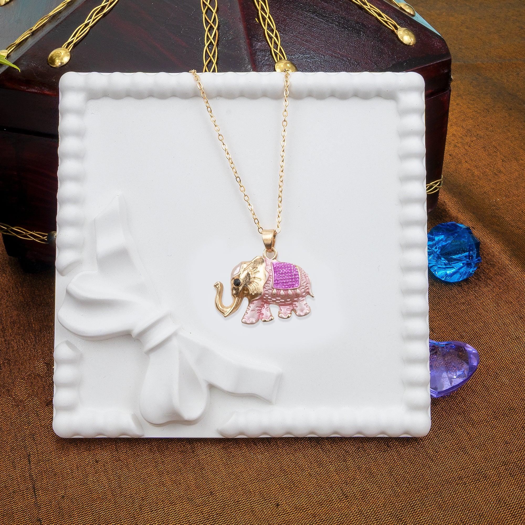 Gold elephant necklace with pink heart on a white decorative box